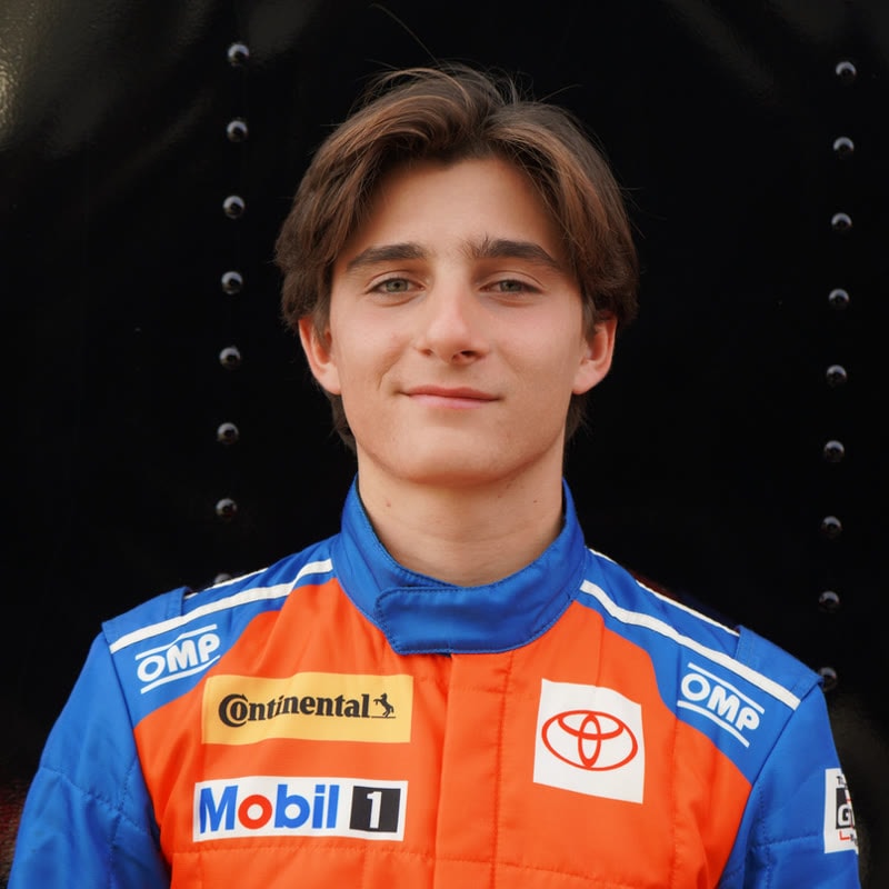 Joseph Maley in his Eagles Canyon Racing suit, eyes to camera.